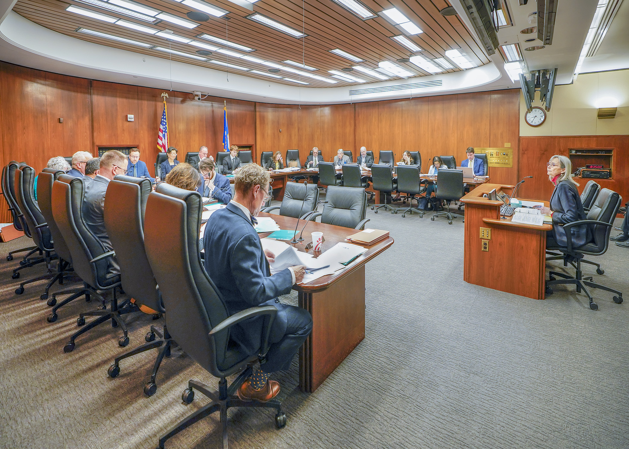 Rep. Ginny Klevorn, chair of the House State and Local Government Finance and Policy Committee, presents the committee’s omnibus policy bill to members March 23. (Photo by Andrew VonBank)